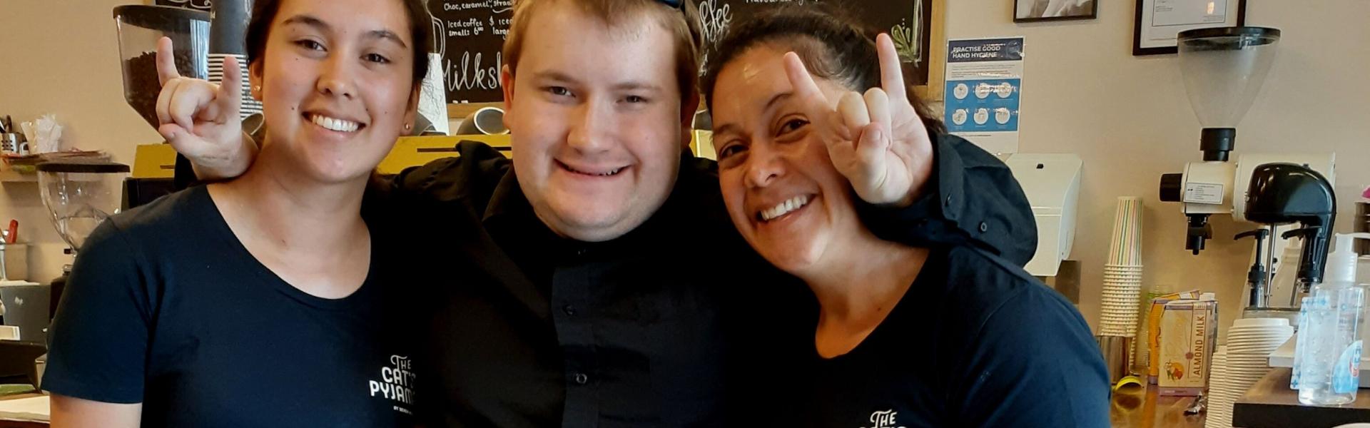 Jack with two friends in the cafe
